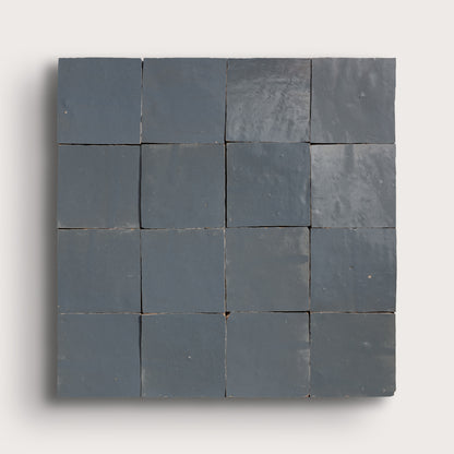 square zellige tiles in a grid on a light gray background