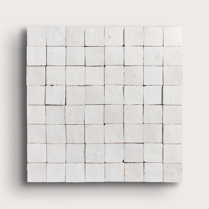 snow white square zellige tile on a light grey background