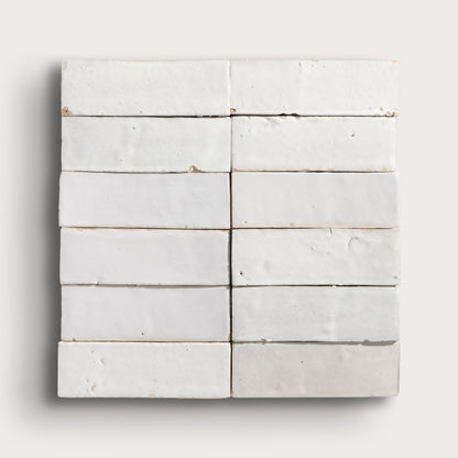 snow white rectangle zellige tile on a light grey background