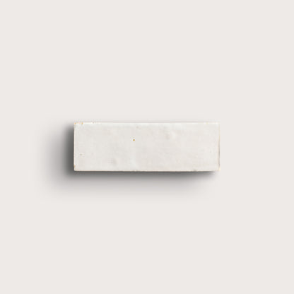 snow white rectangle zellige tile on a light grey background