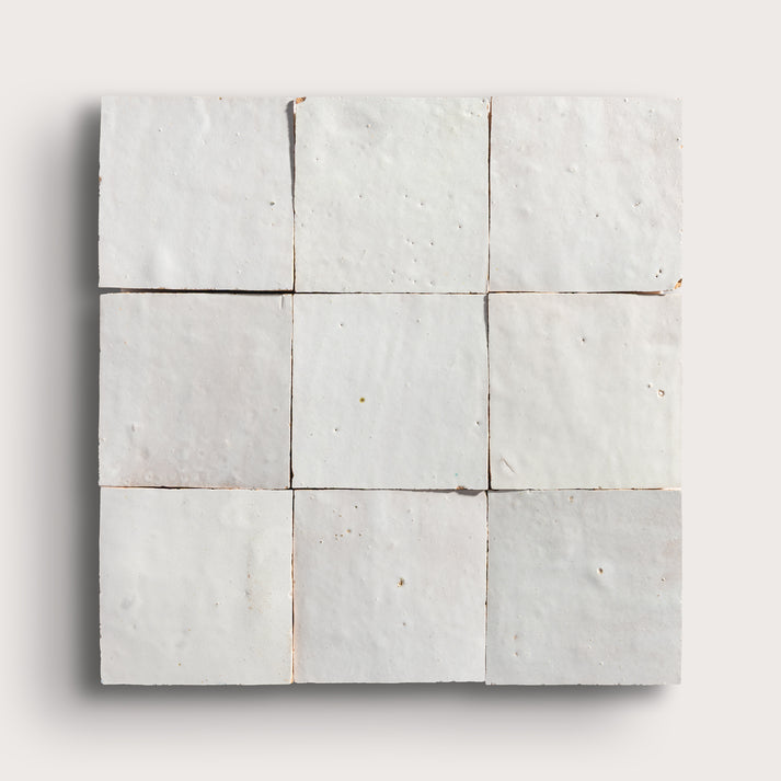 snow white square zellige tile on a light grey background