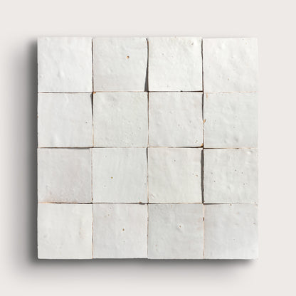 snow white square zellige tile on a light grey background