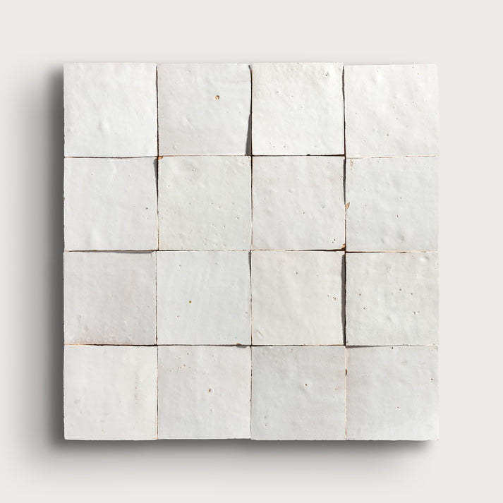 snow white square zellige tile on a light grey background
