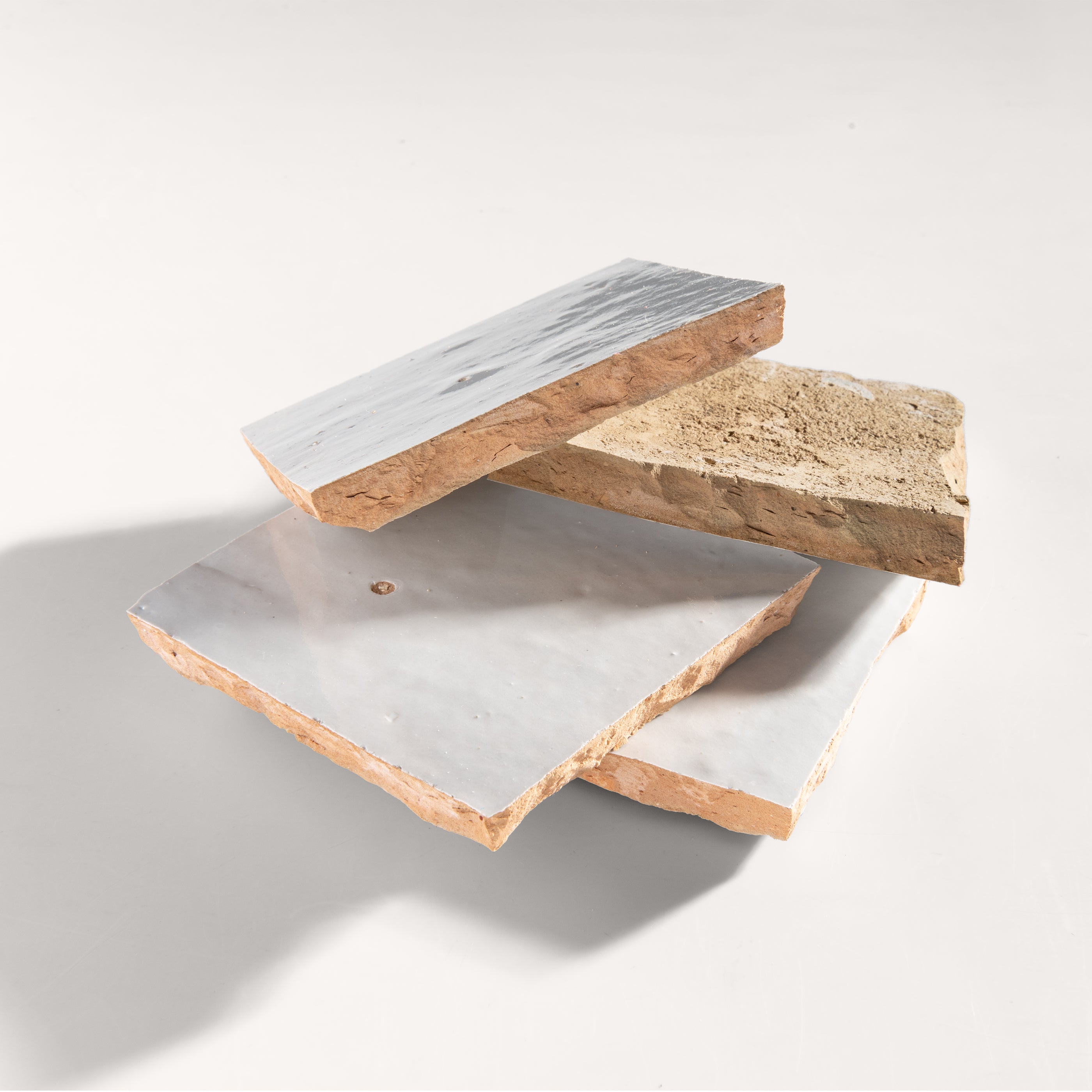 snow white square zellige tile on a light grey background