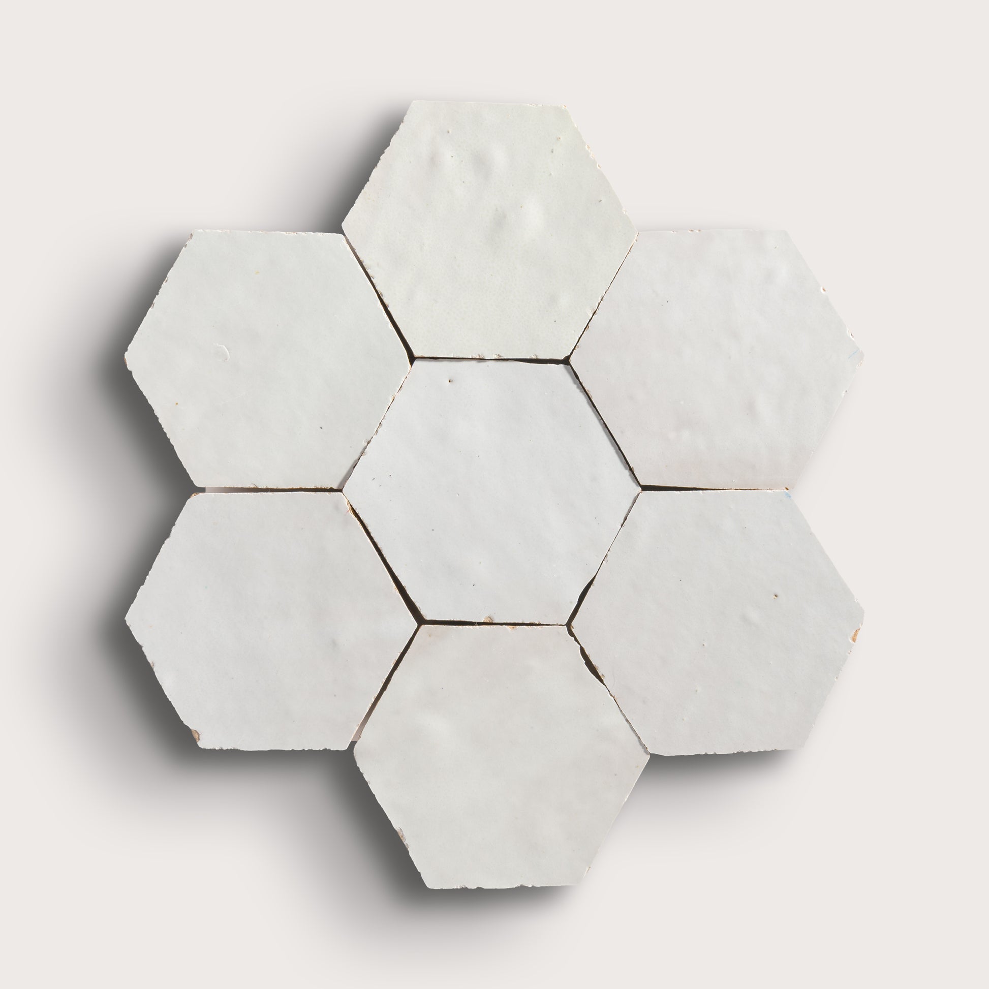 snow white hexagon zellige tile on a light grey background
