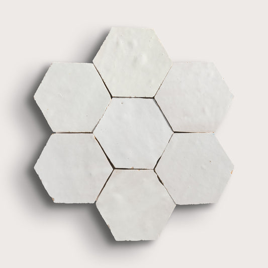 snow white hexagon zellige tile on a light grey background