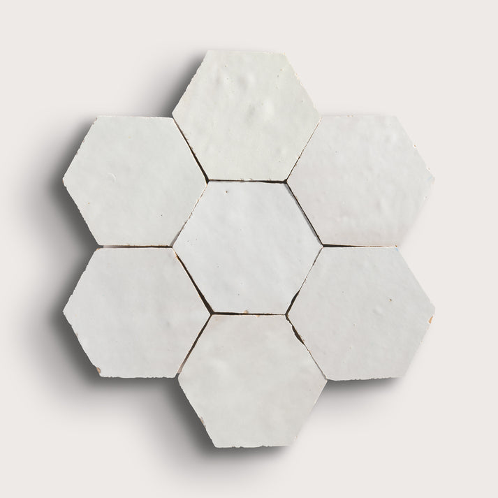 snow white hexagon zellige tile on a light grey background