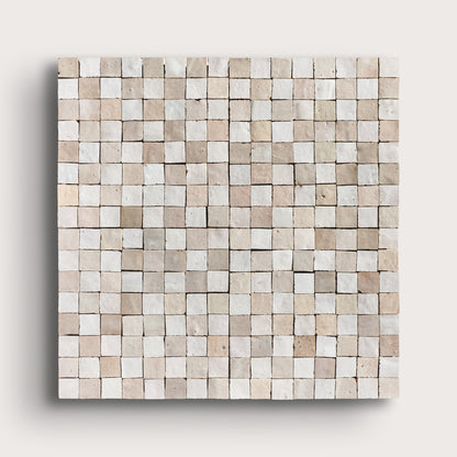 white small square checkerboard zellige tile on a light grey background
