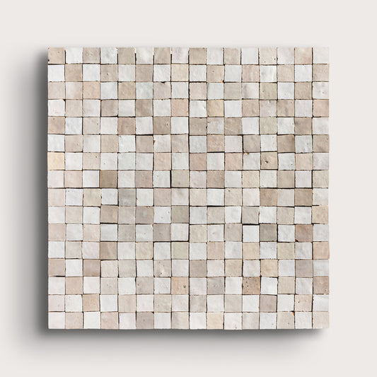 white small square checkerboard zellige tile on a light grey background