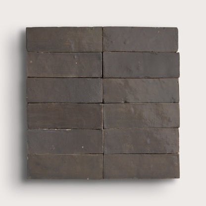 grey rectangle zellige tile on a light gray background