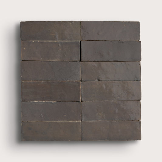 grey rectangle zellige tile on a light gray background