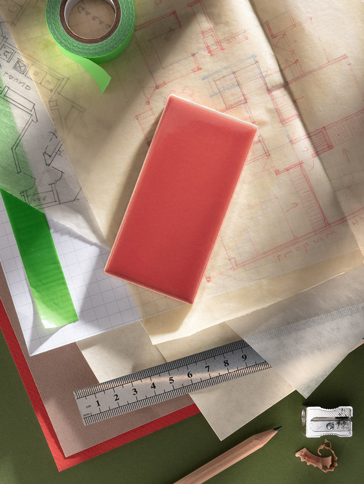 ceramic tile styled on top of blue prints