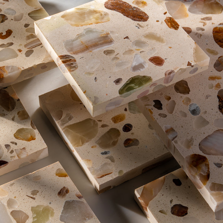Terrazzo stone slabs with a natural stone pattern on a light background