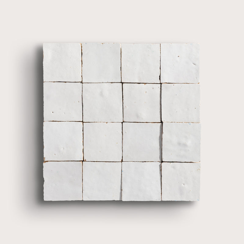 snow white square zellige tile on a light grey background