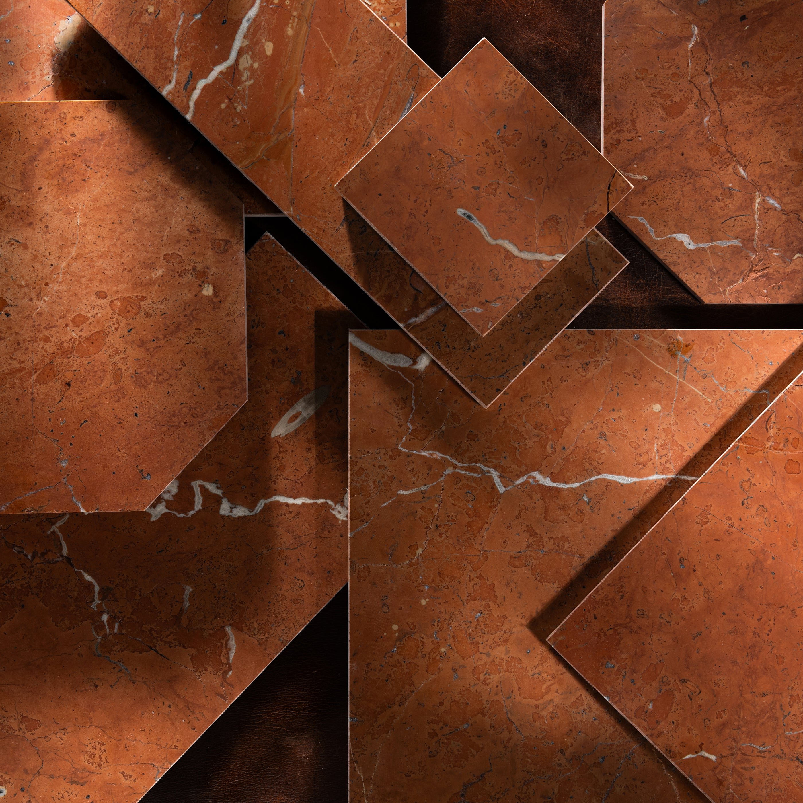 Close-up of brown marble tiles with visible veins