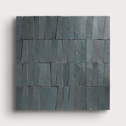Set of zellige tiles arranged in a pattern on a light gray background