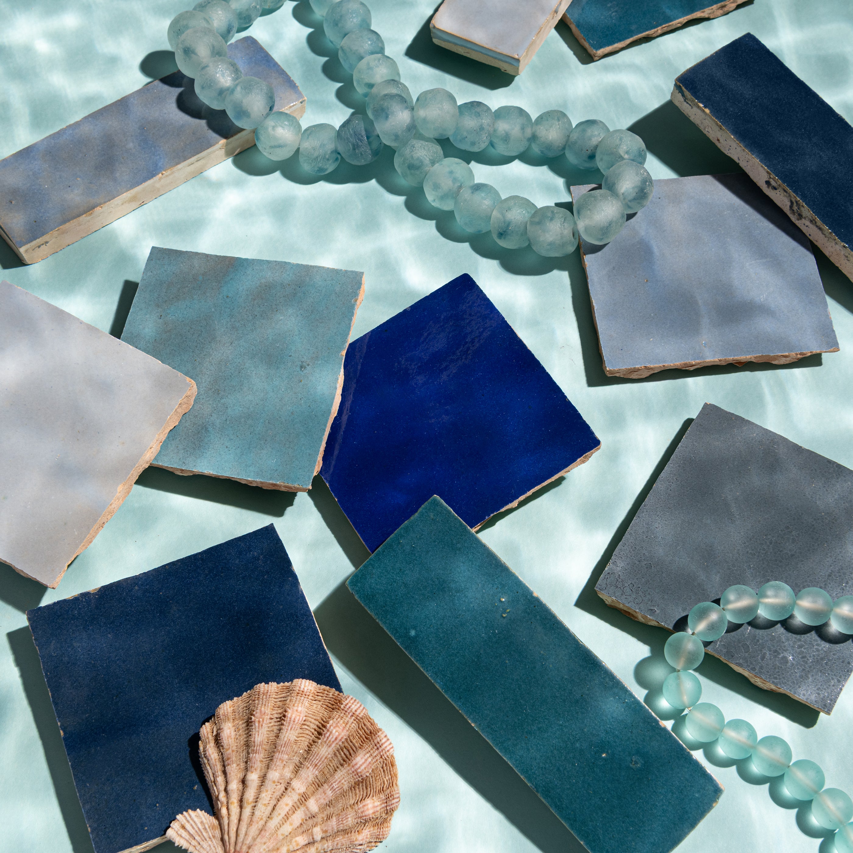 different shades of blue zellige tile on a water background