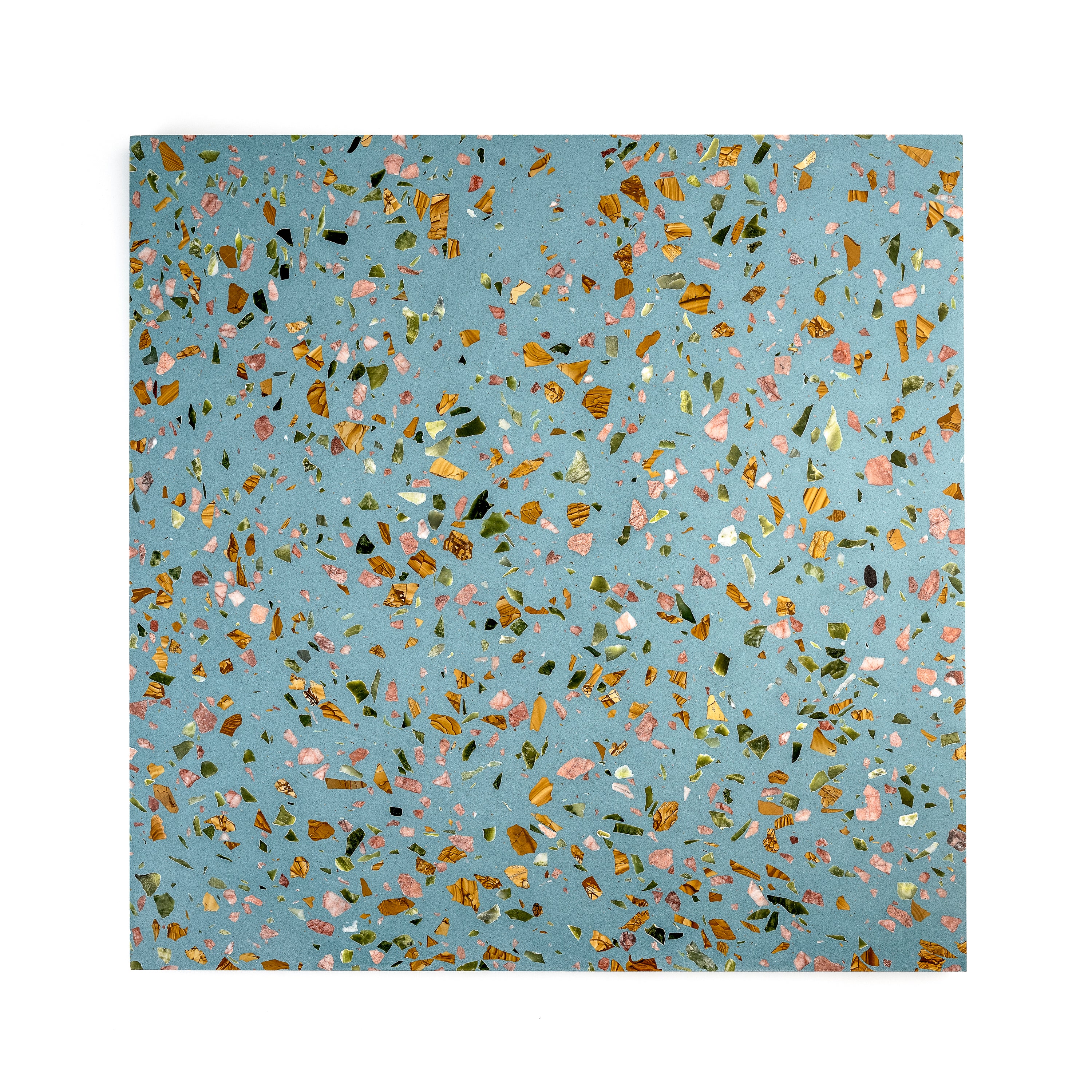 Terrazzo tile close-up showing grey speckled marble and cement finish