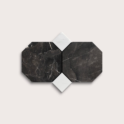 Hexagonal black marble tiles with white grout on a light gray background