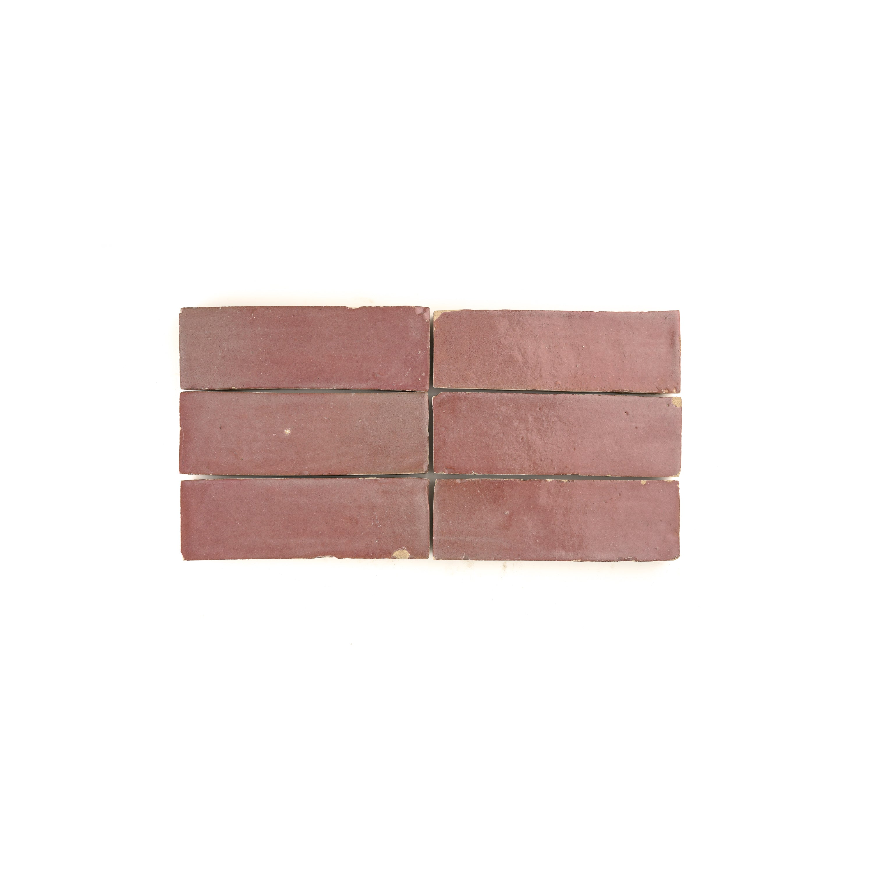 Brick-shaped zellige tiles with a silk-like finish in a bathroom