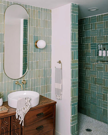 green zellige tile in shower and bathroom wall