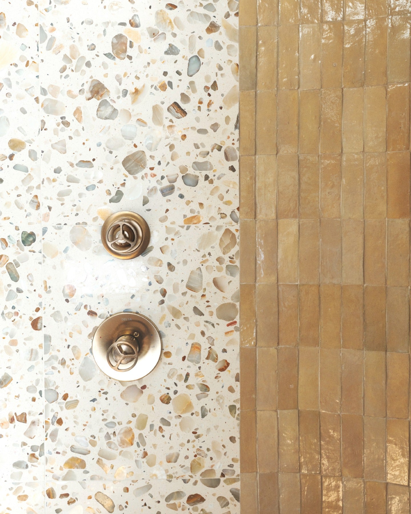 Feel that? Set the mood, then build the room. Warm tones, tactile surfaces and a little shine take it from feeling to fully realized.

Tile: Glazed Clay 2x6 Thin Bejmat Zellige Tile, Rolling Stone 24x24 Venezia Terrazzo Tile
Design/Photo: @villastino (image 4)