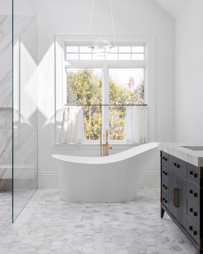When the light hits in all the right places, marble’s magic is truly revealed.

Tile: Calacatta Gold 5 Inch Hexagon Mosaic Marble
Designer: @saltandstone_co
Developer: @rickyvolnay @volnaycapital