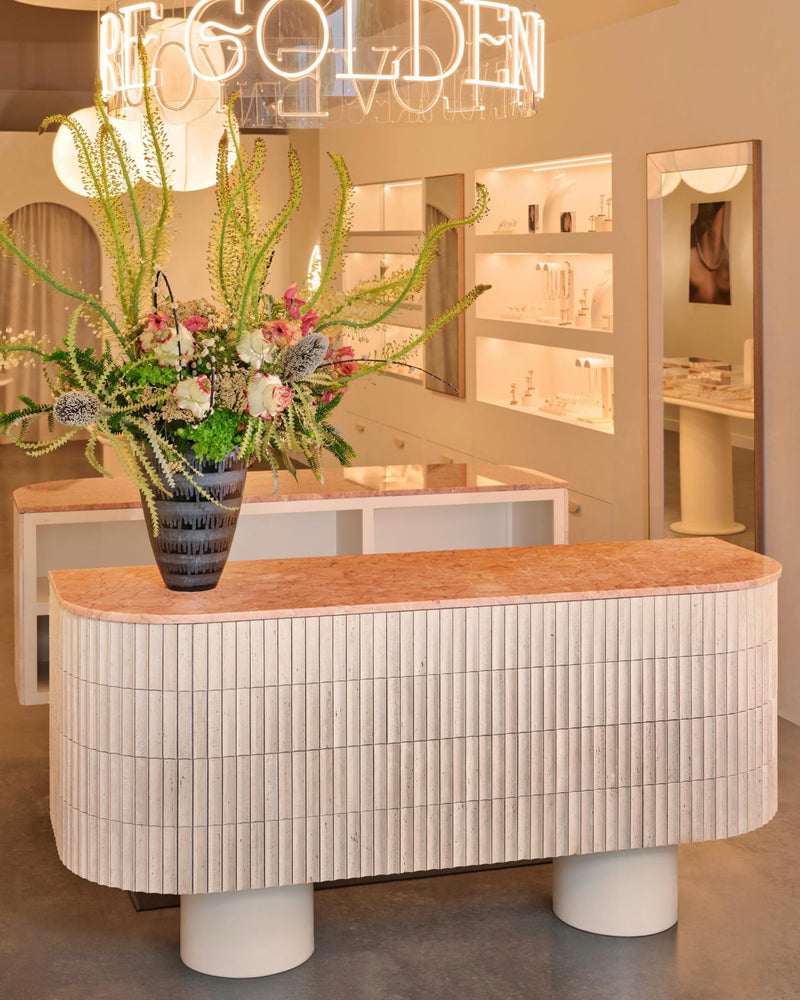 Some spaces invite you to slow down the moment you walk in.

At Mod + Jo, breathtaking jewelry meets the quiet beauty of natural stone, where our Beige Travertine Fluted Mosaic creates a warm welcome worthy of the pieces beyond it. We’re honored to be part of a fellow DFW brand that believes beauty lives in the details.

Tile: Beige Travertine Fluted Mosaic Tile | Honed
Design @punchworld.studio
Photography @lacey_land
Business: @modandjo (Ft Worth location)

#RiadTile #NaturalStone #InteriorDesign  #Summer