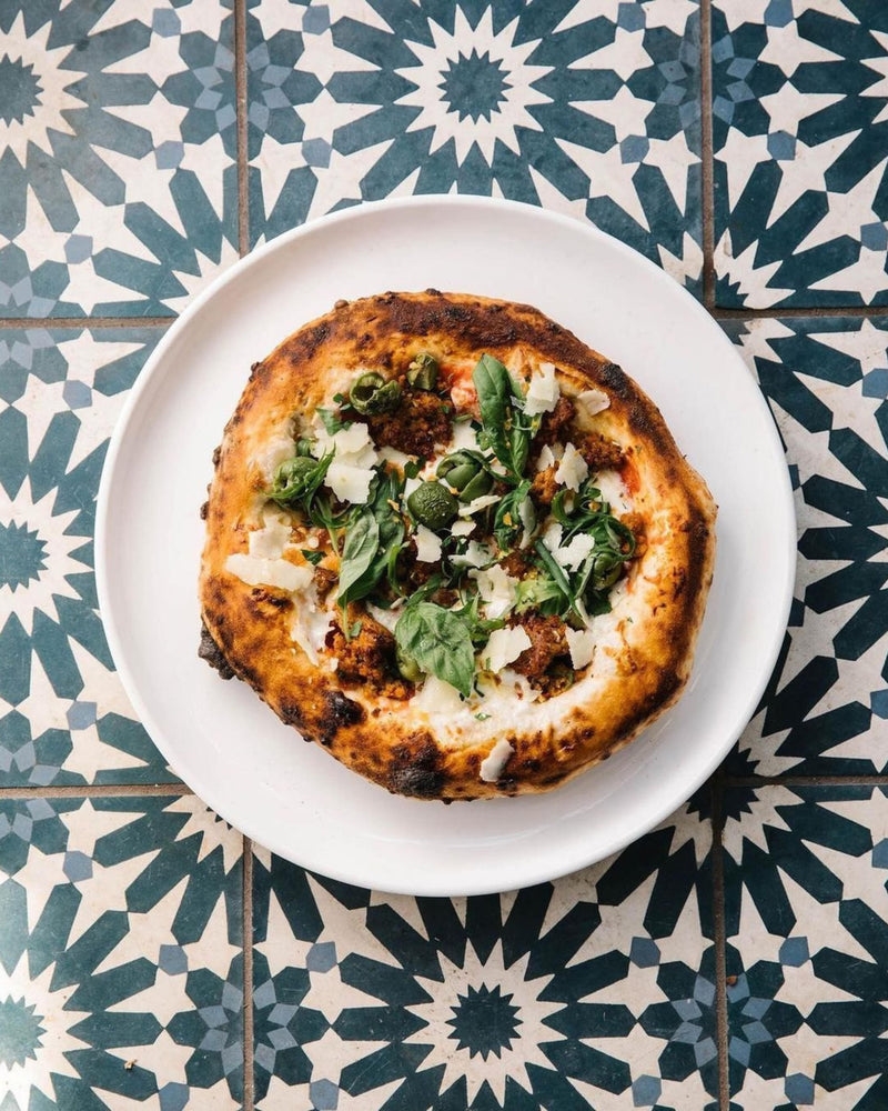Personal-sized. Perfectly patterned. Some moments don’t need to be shared: they just need to be savored. 🍕

Tile: Erizo Blue 8x8
Photo/Pizza: @paradisodallas

#RestaurantDesign #InteriorDetails #TileDesign #DesignInspiration #PizzaLovers