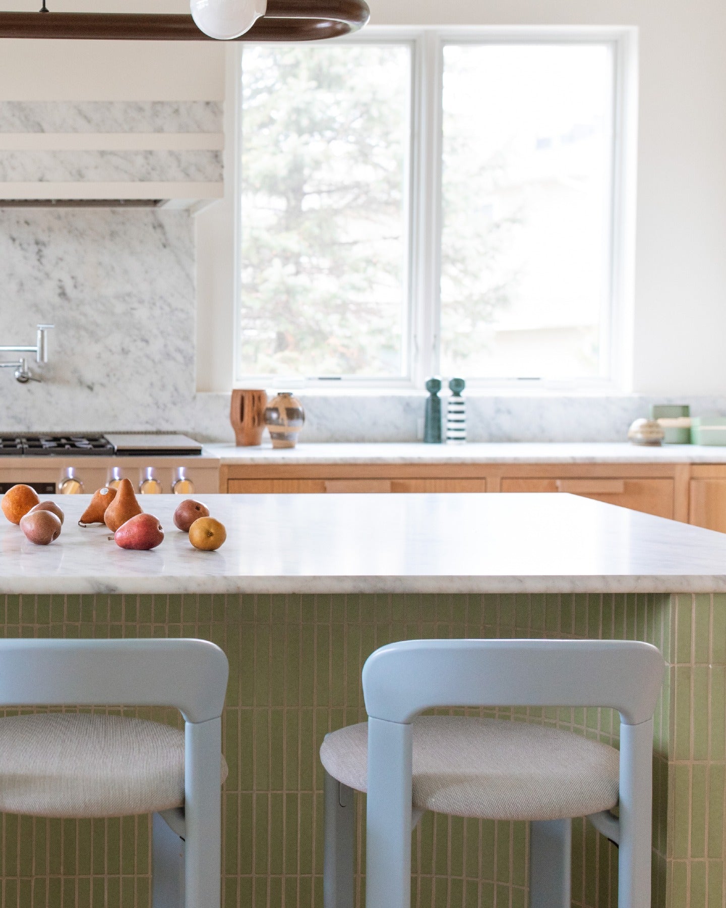 The best gathering spaces give you a reason to linger. Here, a custom Getty Green ceramic mosaic brings color, rhythm and a little personality to the kitchen island.

Interested in going custom? Contact us for options, pricing and lead times.

Tile: Custom Getty Green 1x6 Ceramic Mosaic Matte
Design: @klhcustomhomes
Photo: @kvterob (image 2)