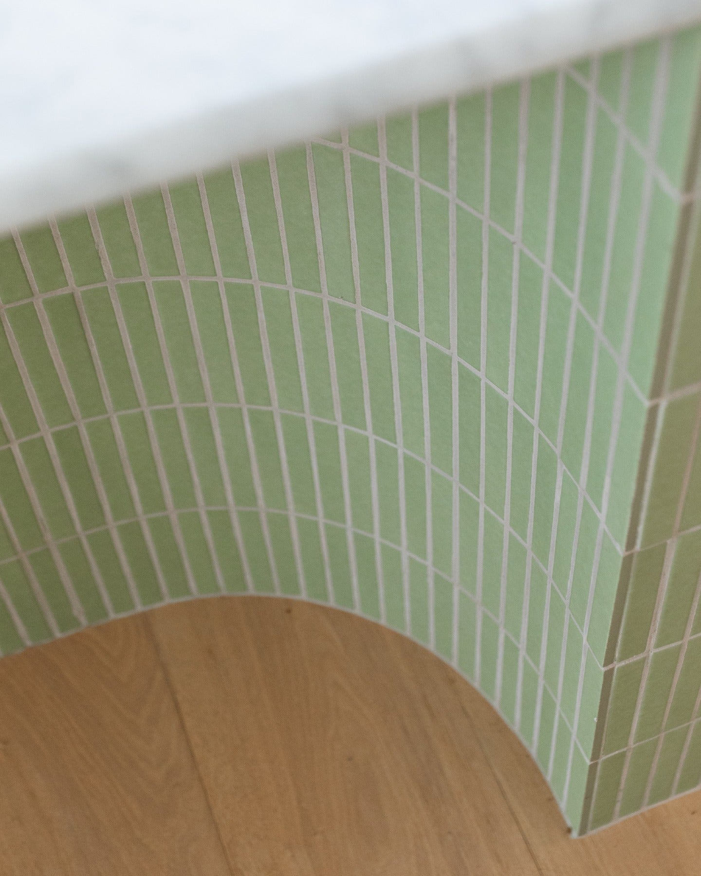 The best gathering spaces give you a reason to linger. Here, a custom Getty Green ceramic mosaic brings color, rhythm and a little personality to the kitchen island.

Interested in going custom? Contact us for options, pricing and lead times.

Tile: Custom Getty Green 1x6 Ceramic Mosaic Matte
Design: @klhcustomhomes
Photo: @kvterob (image 3)