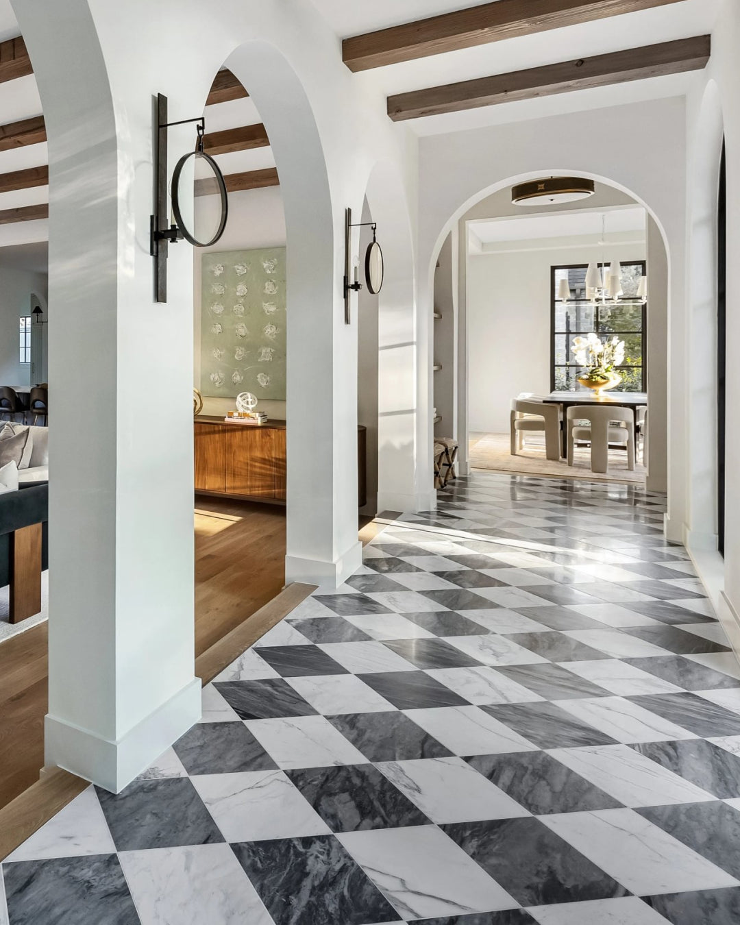 Some of our favorite rooms are ones we’ve never stood in.

You share your homes, and we get to look around. This hall shows why that never gets old: two marbles laid on the diagonal, running under arch after arch to the stairs.

Thank you for letting us in. Tag @riadtile on your project. We see every one.

Tile: Bardiglio Grey Light & Casablanca Carrara 18x18 | Honed Checkerboard
Builder: @fairmonthomesdfw
Design: @studiohaus.interiors 
Photo: @realphototexas (image 2)