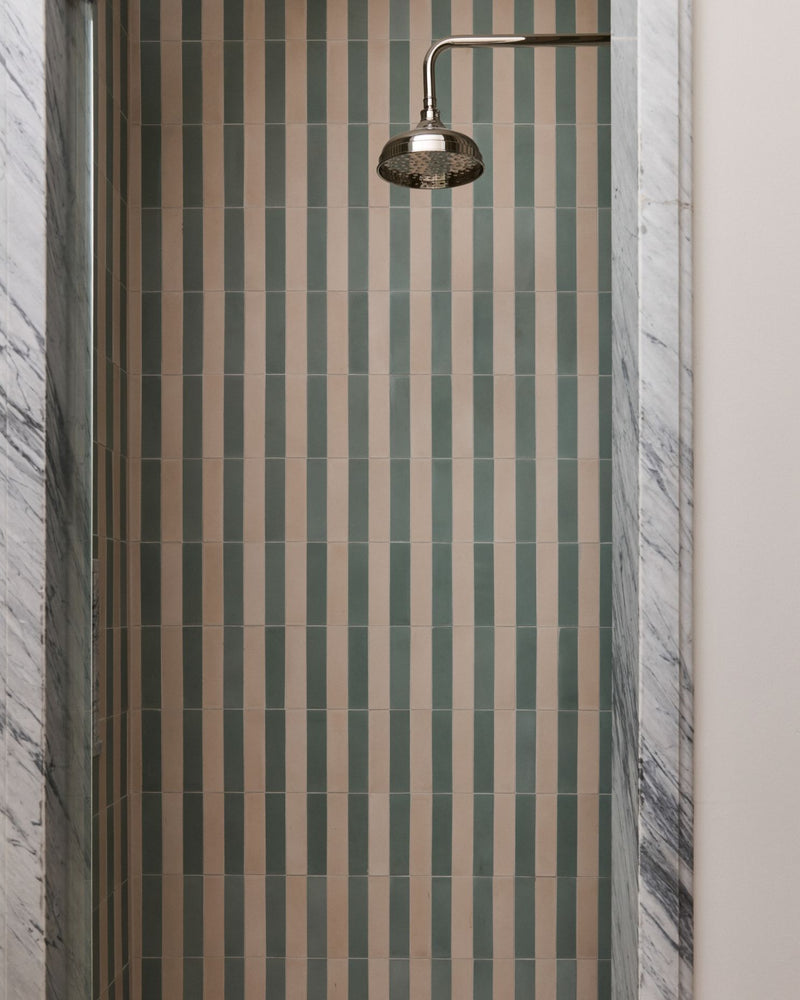 The right colors don't compete. They conspire. Soft Sea Foam meets warm Putty to create a simple repeat that feels anything but expected.

Tile: Sea Foam 2x8 Cement, Putty 2x8 Cement
Design: @me.development 
Photo: @yanglincphoto