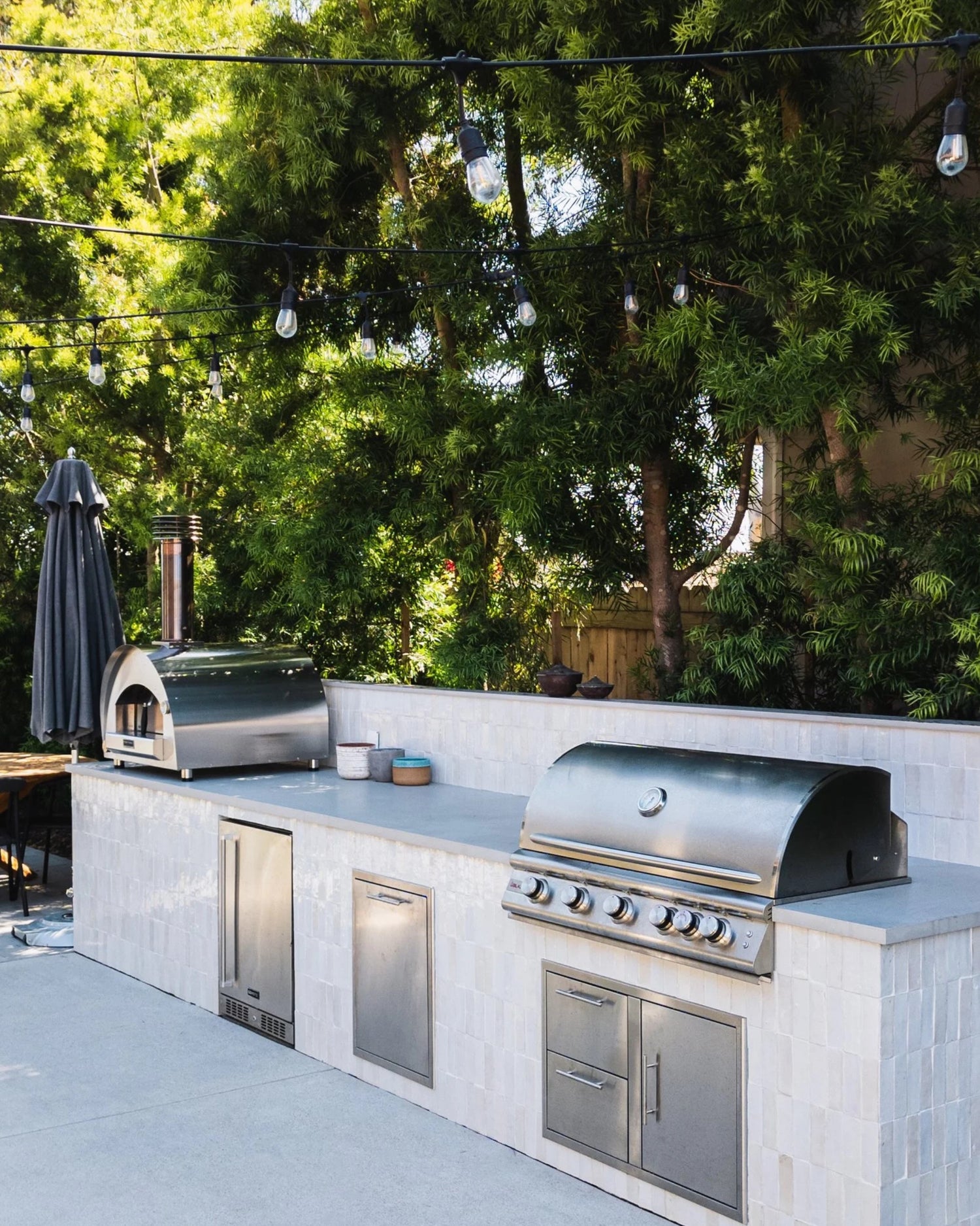Outdoor spaces have a certain way of bringing people together, and this one is no exception. Thoughtfully designed for lingering dinners, easy conversation, and evenings that stretch long after sunset. We love seeing our handcrafted Snow Zellige play a part in bringing this beautiful oasis to life.

If this holiday weekend inspired ideas for your own backyard, our Fourth of July 50% off shipping* promotion is still happening for a limited time. Now’s the perfect opportunity to create a space you’l (image 3)