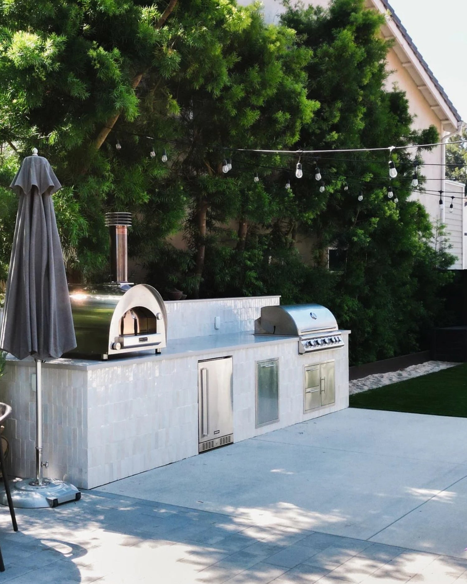 Outdoor spaces have a certain way of bringing people together, and this one is no exception. Thoughtfully designed for lingering dinners, easy conversation, and evenings that stretch long after sunset. We love seeing our handcrafted Snow Zellige play a part in bringing this beautiful oasis to life.

If this holiday weekend inspired ideas for your own backyard, our Fourth of July 50% off shipping* promotion is still happening for a limited time. Now’s the perfect opportunity to create a space you’l (image 5)