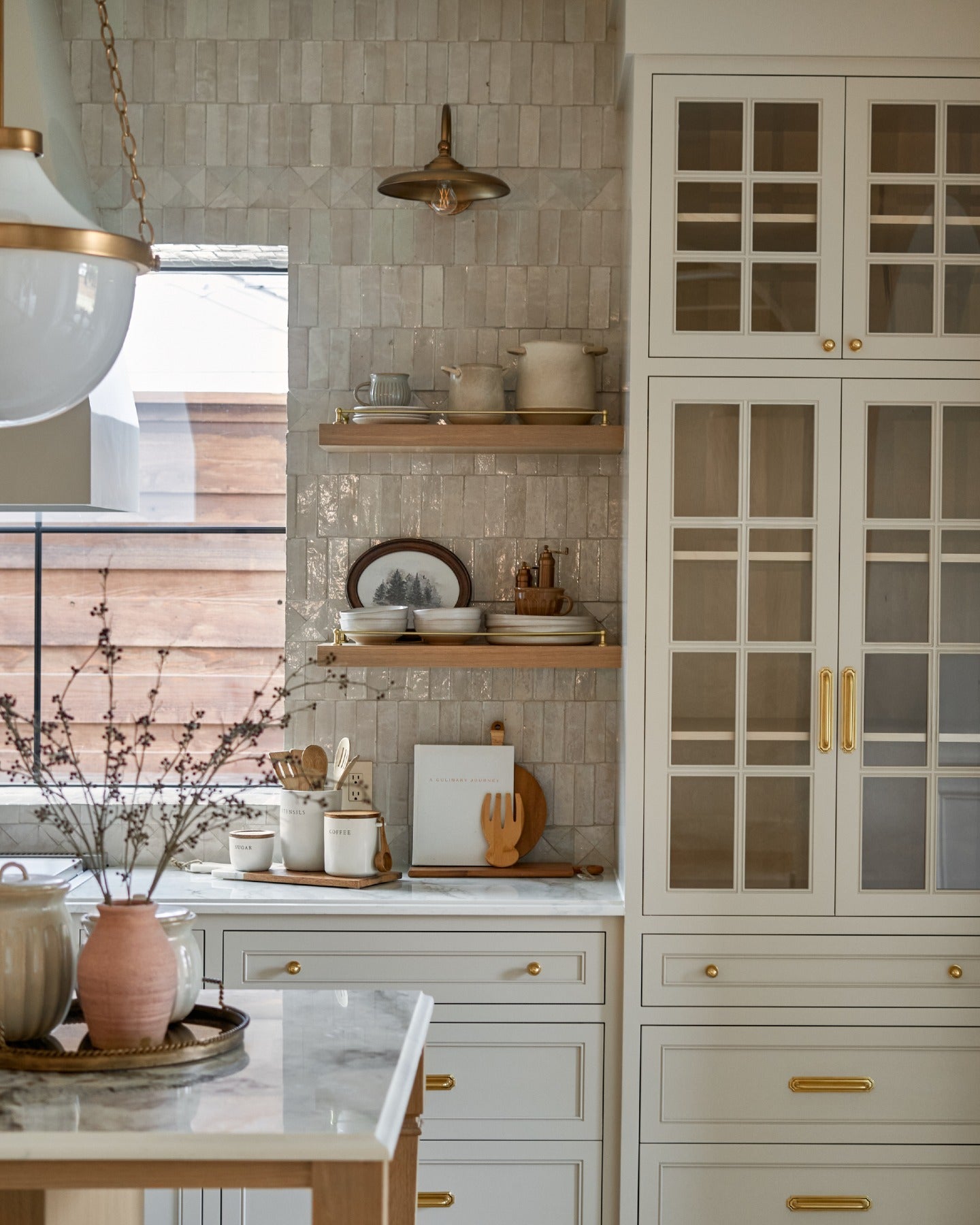 Beautiful homes begin with a shared vision.

Thoughtful architecture, timeless lighting, handcrafted tile, and natural stone carry a quiet sense of continuity from the primary bath to the kitchen, butler's pantry, and laundry room, creating a home that feels beautifully whole.

Created in collaboration with @buildtx and @rejuvenation. (image 2)