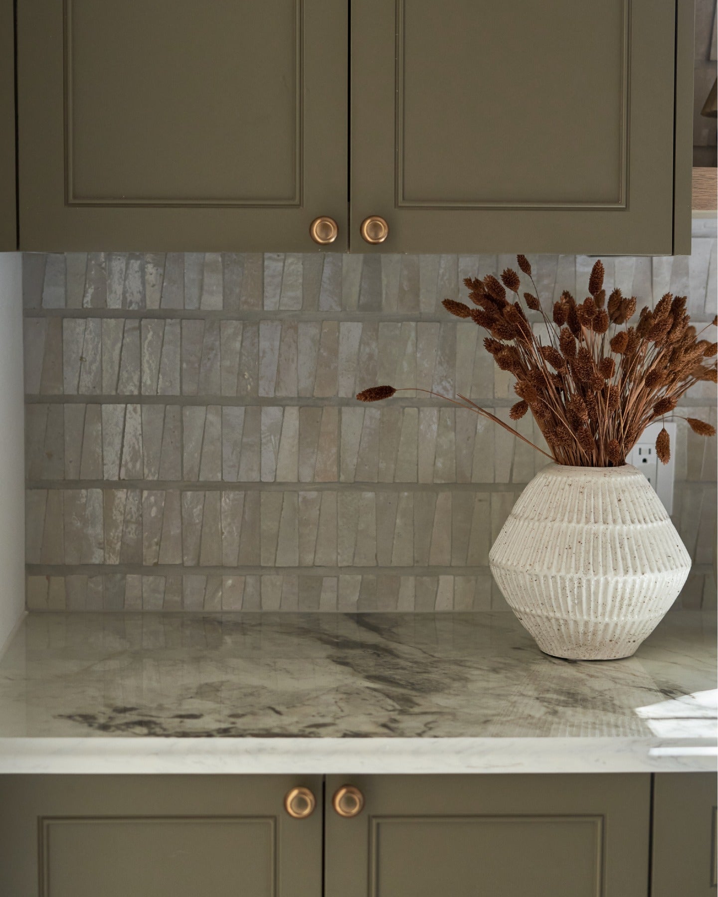 Beautiful homes begin with a shared vision.

Thoughtful architecture, timeless lighting, handcrafted tile, and natural stone carry a quiet sense of continuity from the primary bath to the kitchen, butler's pantry, and laundry room, creating a home that feels beautifully whole.

Created in collaboration with @buildtx and @rejuvenation. (image 9)
