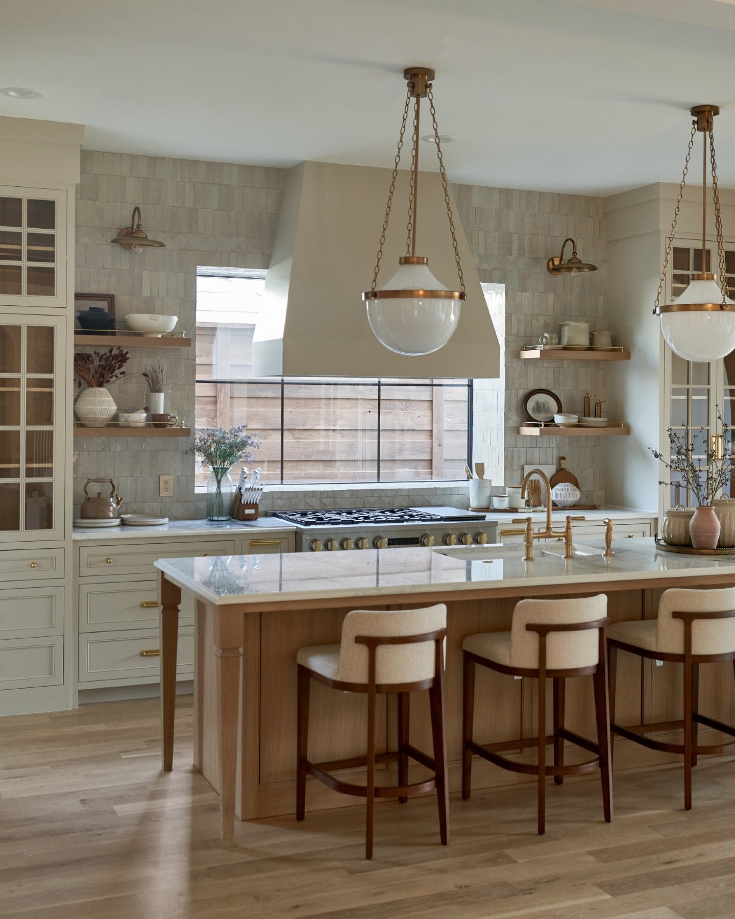 Beautiful homes begin with a shared vision.

Thoughtful architecture, timeless lighting, handcrafted tile, and natural stone carry a quiet sense of continuity from the primary bath to the kitchen, butler's pantry, and laundry room, creating a home that feels beautifully whole.

Created in collaboration with @buildtx and @rejuvenation.