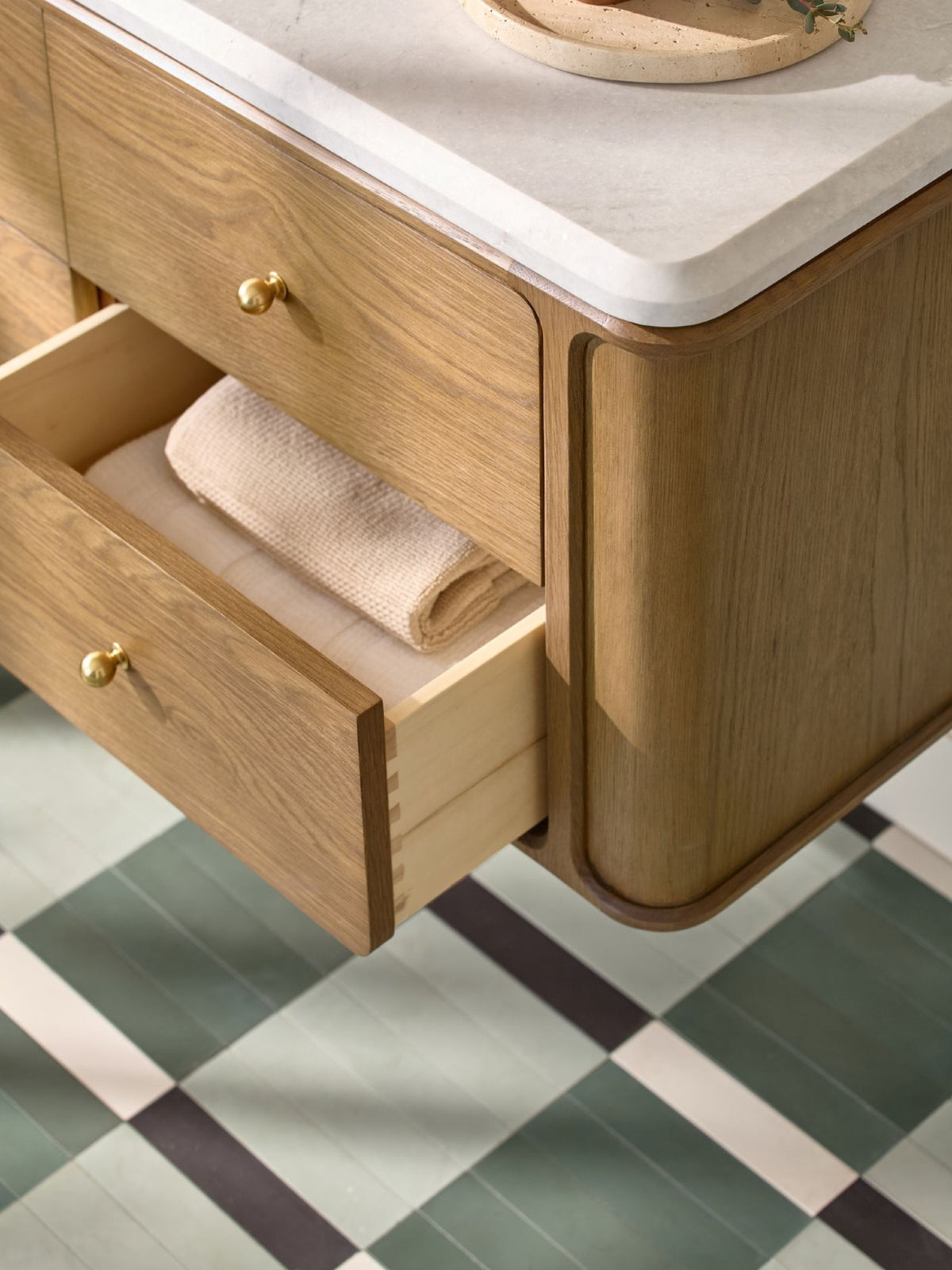 Consider the checkerboard reconsidered.

Smaller scale. Softer color. A shift in proportion. The familiar pattern feels entirely different when you change the pieces.

All photography provided by Rejuvenation.

Tile: Casablanca Carrara & Bardiglio Grey Marble 3 Inch Checkerboard Mosaic Marble Tile Honed | White, Sea Foam, Green and Black 2x8 Cement Tile | Octagon Black Terracotta 4" & Bouchon Black Marble Bundle Octadot Checkerboard (image 3)
