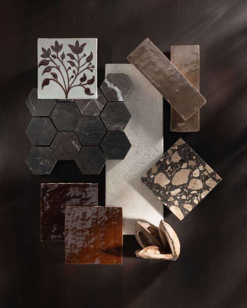 Consider this brown's leading role.

Chocolate glaze, warm stone, and earthen tones prove there's nothing basic about going back to brown. This shade has range.

Tile: Tansy Umber Bloem 4x4 Zellige Tile, Truffle 2 Inch Hex Marble | Honed, Chocolate 4x4 Zellige Tile, Azru Sand 4x12 Moroccan Limestone | Hammered & Tumbled, Hazel 2x6 Thin Bejmat Zellige Tile, Mocha Stone 4x4 Venezia Terrazzo Tile