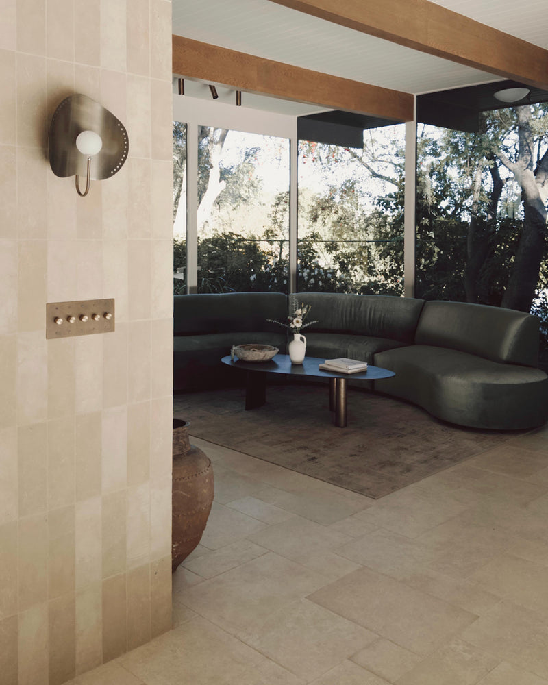 Some materials decorate a room. Others define it.

Tile brings depth, durability, and natural character to living spaces while creating a seamless foundation for everyday life. It’s time for a role beyond kitchens and bathrooms.

Tile: Azru Sand 4x12 Moroccan Limestone | Hammered & Tumbled
Design/Photo: @nicoleisaacs