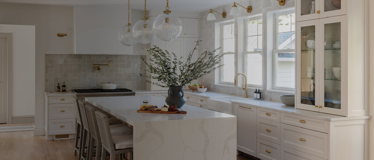 white kitchen with zellige and marble tile