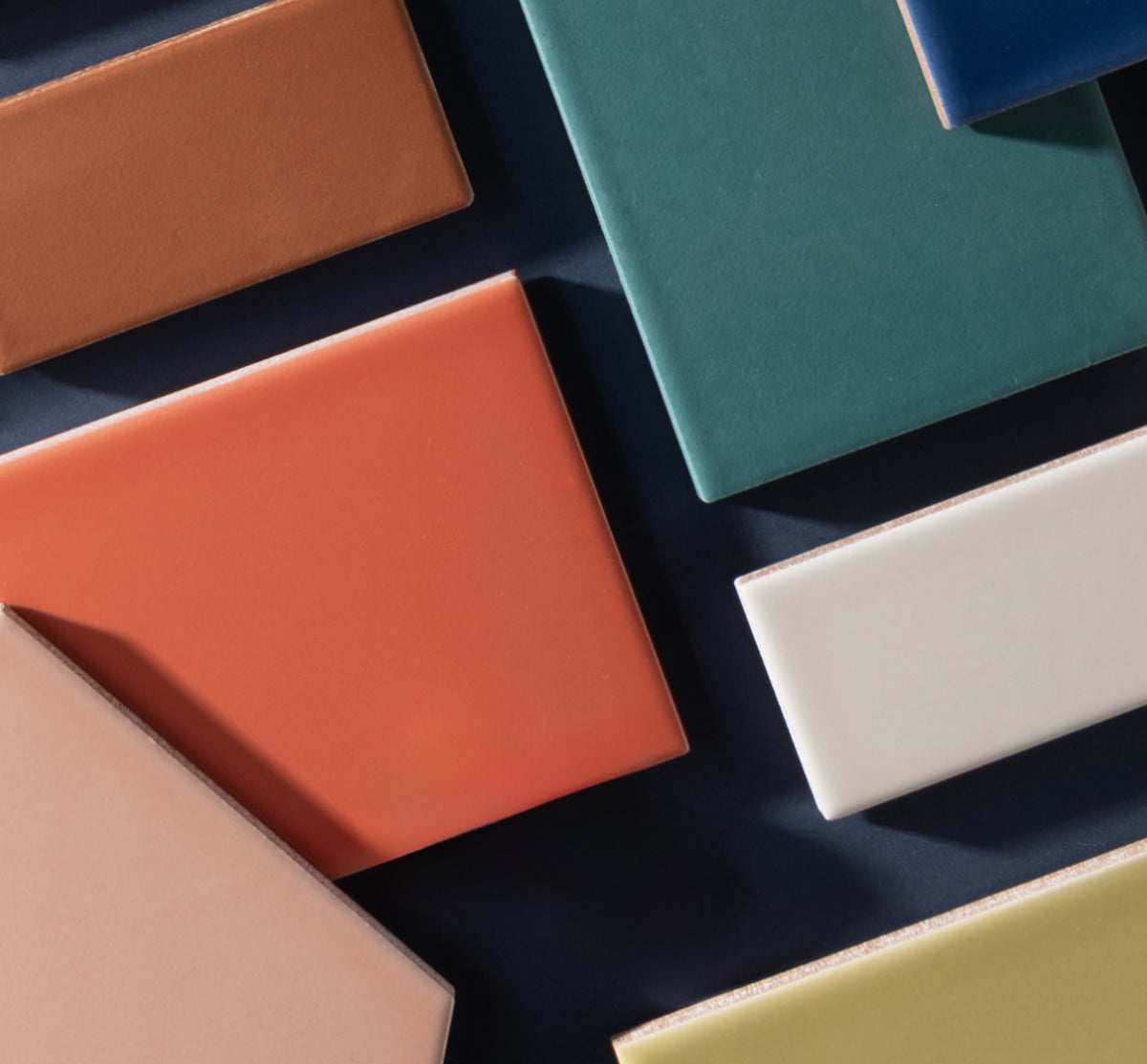 multi color flat lay of ceramic tiles in different sizes