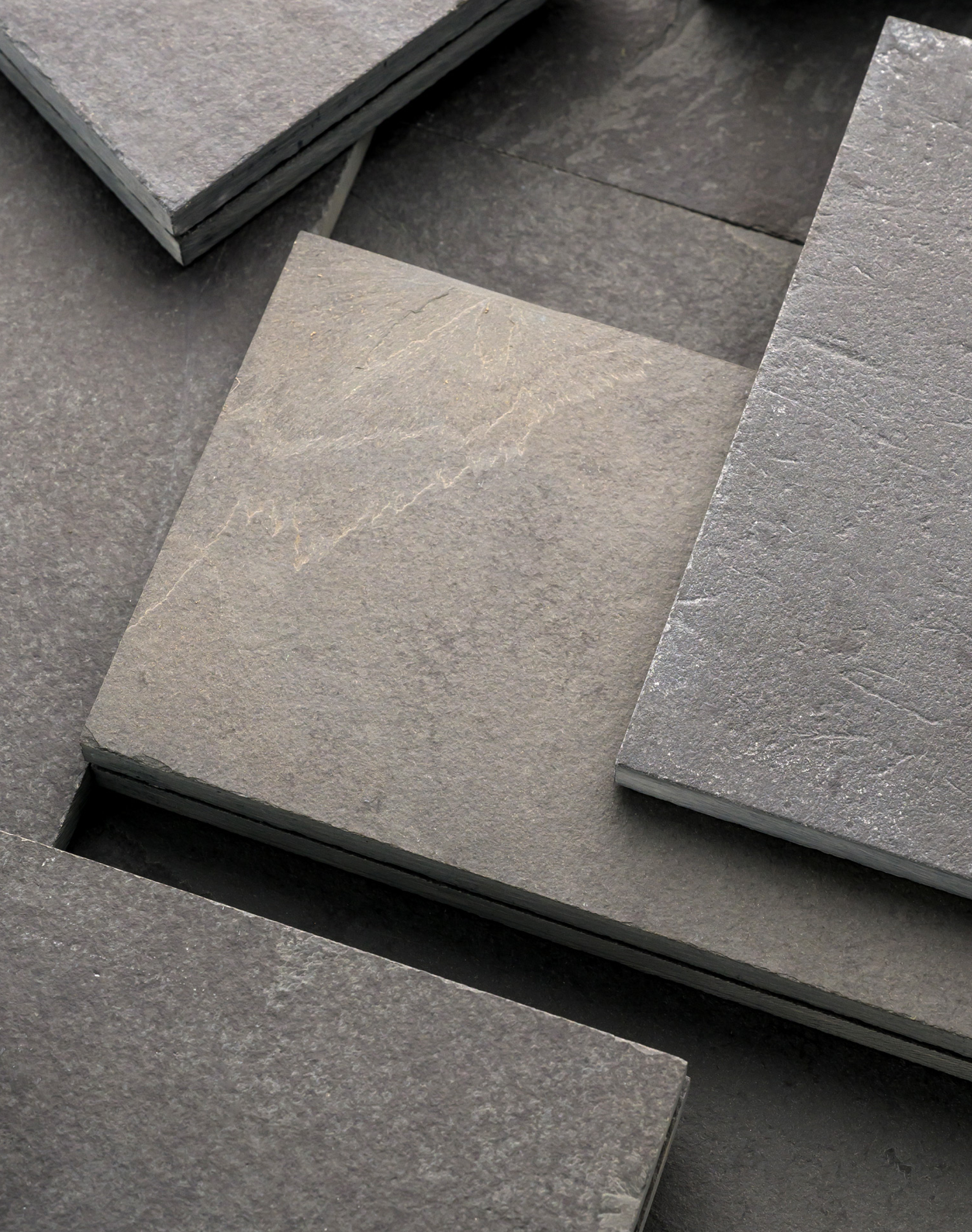Close-up of gray slate tiles arranged in a pattern