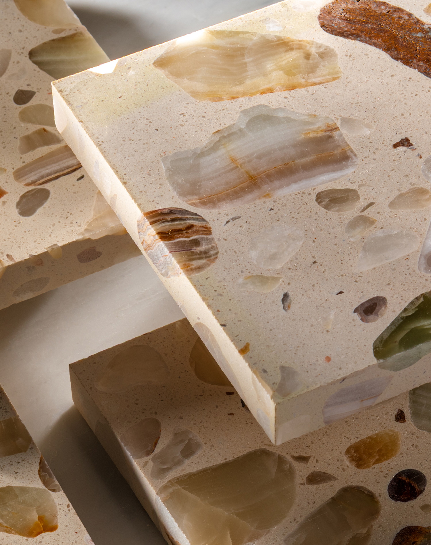 Close-up of a terrazzo-style surface with natural stone patterns