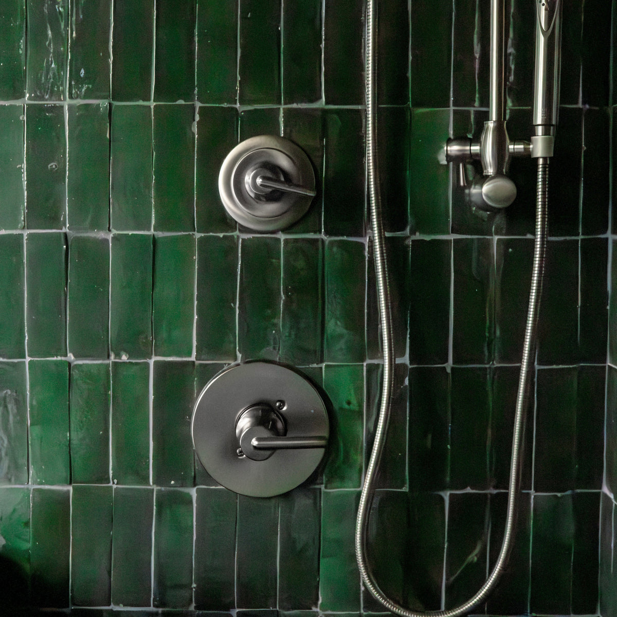 green zellige tile in shower